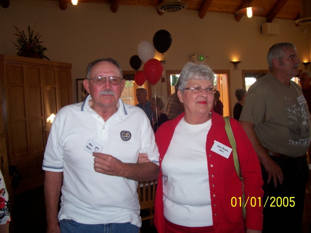 Mike and June Moore (background Ed Miller)